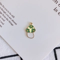 Detail of yellow and green mushroom alloy pendant for DIY jewelry on a book background - Yellow (4#)