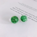 Macro shot of green spherical resin earrings filled with shimmering decorative flakes - Green Shredded Style (4#)