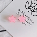 Close-up of pink star-shaped resin charms with shimmering glitter for DIY jewelry making - Light Pink (1#)