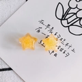 Close-up of star-shaped acrylic resin pendants with gold glitter in bright orange - Orange-Yellow (4#)