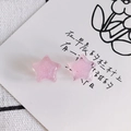 Close-up of a pink star resin charm with fine glitter for DIY jewelry making - Translucent Pink (6#)