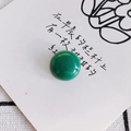 Macro detail of a polished green malachite cabochon bead for DIY jewelry making - Dark Green Malachite Style (5#)