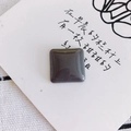Macro detail of a square resin stone charm with polished finish for DIY jewelry crafts - Dark Gray Color (3#)