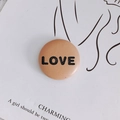 Minimalist round leather button featuring LOVE engraving in a camel brown vintage finish - 14# Pink