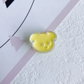 Macro shot of yellow bear-shaped resin DIY charm with three holes on artistic background - 9# Yellow