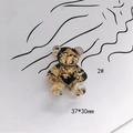Macro shot of 37x30mm DIY teddy bear charm with gold foil flakes in black resin - Black Gold Foil Style (2#) / 37x30mm