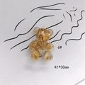 Macro detail of acrylic bear charm 41x30mm with gold foil flakes and metal hanging loop - Large Clear Gold Foil Style (6#)