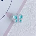 Pendentif papillon en résine transparent avec détails turquoise pour accessoires cheveux - Cyan