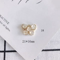 Detailed view of 21x16mm gold butterfly pendant with rhinestones and white shell flowers - Butterfly & Flower Style (1#)
