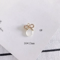 Dettaglio del ciondolo a fiocco 16x13mm con cristalli rosa e pietra occhio di gatto - Stile Fiocco con Strass (4#)