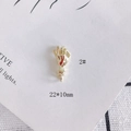 Macro detail of a 22x10mm gold palm pendant for DIY fashion jewelry accessories - OK Gesture Gold (2)