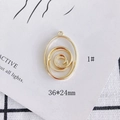Detailed view of a gold-plated spiral star pendant with dimensions 36x24mm for DIY jewelry - Spiral Oval Style (1#)