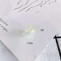 Close-up of 14mm hollow glass bead with yellow and blue spiral patterns for DIY jewelry - 8# Style (KP4175)
