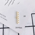 Macro shot of 36x9mm gold plated multi-strand connector with 5 loops for DIY jewelry making - Multi-hole Connector Bar Style (4#)