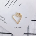 Detail van een 32x25mm gouden hart hanger met spiraalpatroon voor DIY sieraden maken - Hartstijl (3#)