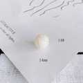 Macro view of 14mm hollow glass bead with colorful spiral patterns for DIY jewelry making - 14# Style (KP4175)