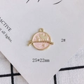 Detail view of a cat-themed pink enamel pendant with gold trim and starry orbital design - Cat Galaxy Style-Light Pink (2#)