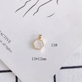 Detailed view of a 13x12mm hexagonal 18k gold-plated shell pendant with a pearly finish - Hexagon Shell Style (13#)