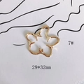 Vista macro de colgante de flor hueca dorada de 29x32mm para accesorios de joyería DIY - Flor de Estrella Simple Moderna (7#)