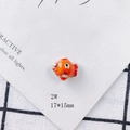 Close-up of orange handmade ceramic fish bead style 2 measuring 17x15mm for DIY jewelry - Orange-Red Glazed Fish Style (2#)