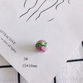 Detail view of a 15x16mm lavender ceramic fruit bead with green leaf for DIY jewelry - Purple Plant Shape (3#)