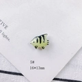 Detail view of a 16x13mm yellow ceramic fish bead with black stripes for DIY jewelry making - Pale Yellow Striped Fish Style (5#)