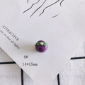 Close-up of a 14x15mm purple mangosteen ceramic bead for DIY jewelry making - Mangosteen Style (4#)