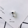 Detail shot of a white skull ceramic charm measuring 16x12mm for DIY jewelry making - Hand Painted Skull Style (8#)