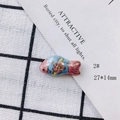Macro view of handmade pink and blue ceramic fish pendant with flower pattern 27x14mm - Pink and Blue Color Block (2#)