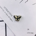 Detailed macro view of a 17x13mm yellow ceramic butterfly bead for DIY jewelry making - Butterfly Style (2#)