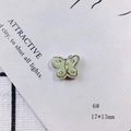 Macro shot of 17x13mm light green ceramic butterfly bead with yellow dots for DIY jewelry - Butterfly Shape (6#)