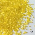 Detailed view of 2mm transparent yellow glass bugle beads for DIY jewelry making - 50g (Approx. 5200 Pcs) / Bright Yellow (6#)
