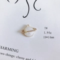 Detail of Saturn pendant with white enamel inlay, rhinestones, and star charm decoration - Star Saturn Shape Style (7#)