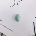 Detailed view of oval light green aventurine stone with polished smooth glossy finish - Light Green (1#)