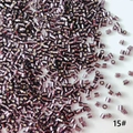 Macro shot of 2mm silver-lined purple glass tube beads for DIY jewelry making - 50g (Approx. 5200 Pcs) / Metallic Purple (15#)