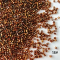 Macro detail of 2mm amber brown silver-lined glass bugle beads for DIY jewelry making - 50g (Approx. 5200 Pcs) / Amber Brown (18#)