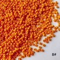 Détail des perles de rocaille orange de 2mm en verre pour la fabrication de bijoux DIY - Paquet de 50g (environ 3300 pièces) / Orange Ambré (8#)