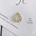 Detailed view of pear-shaped golden pendant with white pearls and sparkling crystals - 10#