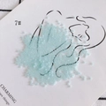 Macro view of 2mm light blue glass seed beads on a minimalist line art display card - 450g Pack (Approx. 57600 Pcs) / Size 7