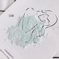 Macro detail of 2mm light blue glass seed beads arranged on a creative display card - 450g Pack (Approx. 57600 Pcs) / 10#