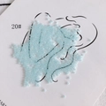 Macro detail of 2mm light blue glass seed beads with glossy finish on artistic canvas - 450g Pack (Approx. 57600 Pcs) / 20#
