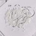 Close-up of 2mm cream-colored glass seed beads for DIY jewelry on a minimal card - 450g Pack (Approx. 57600 Pcs) / 23#