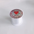 Detailed view of 0.2mm clear elastic crystal string roll for DIY jewelry making - 0.2mm (Single Roll)