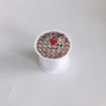 Macro shot of 0.4mm clear elastic bead string on spool for DIY jewelry making projects - 0.4mm (Single Roll)