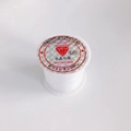 Macro shot of 0.8mm transparent elastic crystal string spool for DIY jewelry making - 0.8mm (Single Roll)