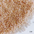 Detailed macro view of 2mm iridescent AB coated peach glass seed beads for DIY jewelry - Style 10# / 450g Pack / Iridescent Peach