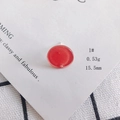 Detail of red circular acrylic earring with subtle glitter on decorative card - 1# Red Glitter