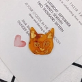 Detailed macro view of orange marble resin cat pendant with gold embossed facial features - Amber Marble Texture Style (2#)