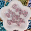 Perles nœuds en strass rose et argent brillant pour création de bijoux DIY - Nœud / 38x28x11mm / Rose