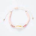 Bohemian adjustable shell bracelet with pink clay discs and gold beads on white background - Pink